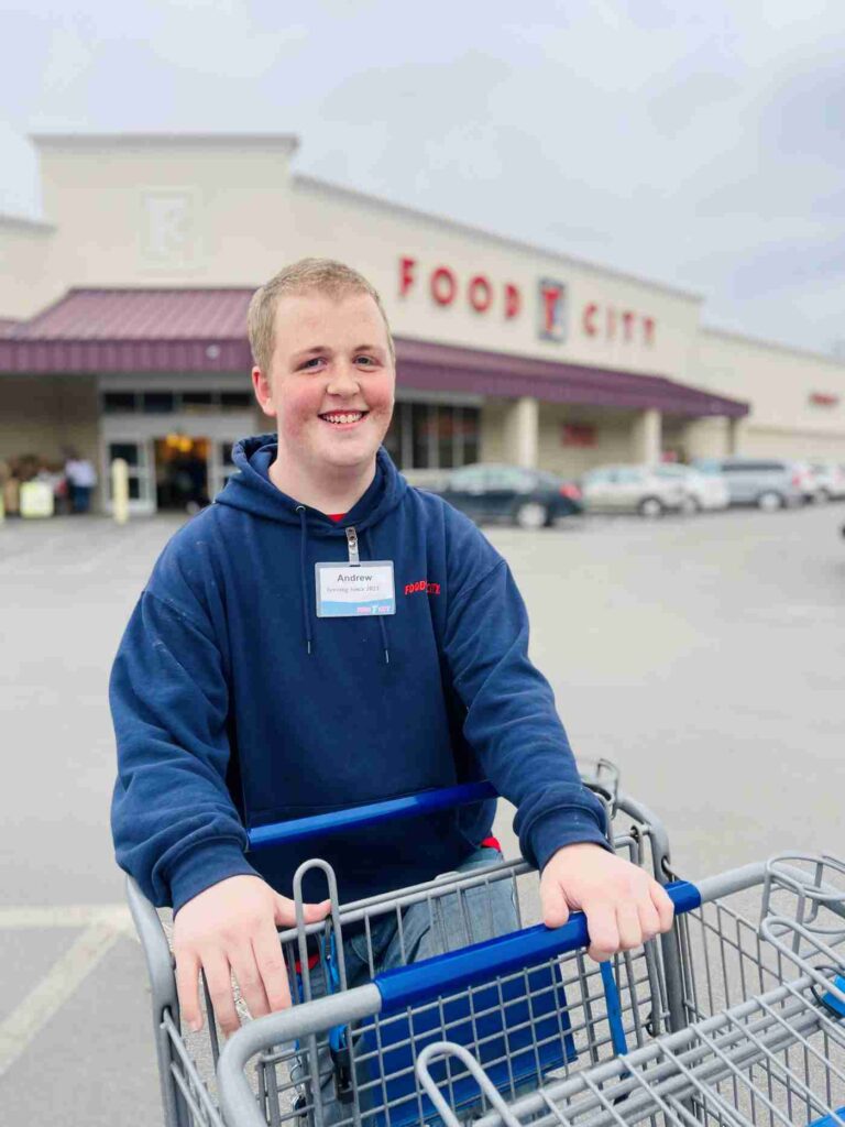 Andrew collecting carts